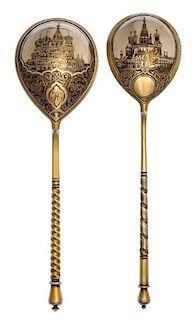 * Two Russian Silver-Gilt and Niello Spoons, Various makers, Moscow, 19th century, each having a twist handle, the underside of