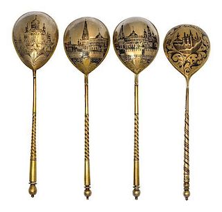 * Four Russian Silver-Gilt and Niello Spoons, Various makers, Moscow, 19th Century, each having a spherical finial surmounting a