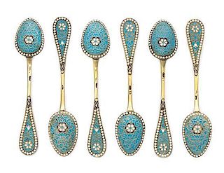* A Set of Six Russian Silver and Enamel Demitasse Spoons, Maker's mark Cyrillic SK, Moscow, late 19th century, having a light b