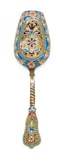 * A Russian Enameled Silver and Plique-a-Jour Tea Scoop, , having a polychrome enamel and twist decorated handle, the scoop surr