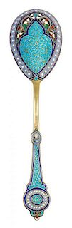 * A Russian Silver-Gilt and Enamel Serving Spoon, Mark of Antip Kuzmichev, Moscow, late 19th/early 20th century, the handle and