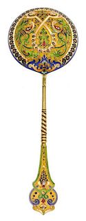 * A Russian Silver-Gilt and Enamel Spoon, Mark of 11th Artel, Moscow, early 20th century, the handle decorated with polychrome f