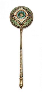 * A Russian Silver-Gilt and Enamel Spoon, Mark of I.P. Khlebnikov with Imperial warrant, Moscow, late 19th century, having a gre