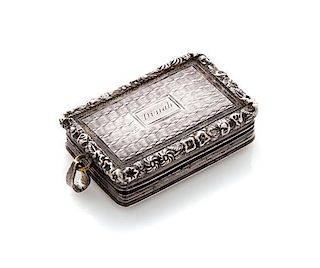 * A George IV Silver Vinaigrette, Maker's mark T&WS, Birmingham, 1822, having a floral and foliate decorated border centered by