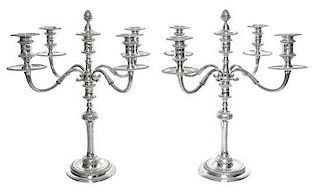 A Pair Elizabeth II Silver Five-Light Candelabra, Garrard & Co, London, 1925, each central cup with a removable pine-cone finial