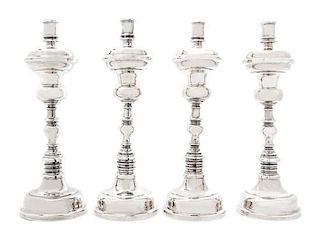 * A Set of Four Mexican Silver Candlesticks, Casa Prieto, Mexico City, 1960s, each with a knopped baluster stem.