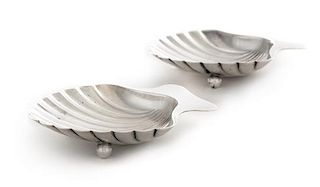 * A Pair of American Silver Ash Receivers, Tiffany & Co., New York, NY, 1937, each of shell form with two feet.