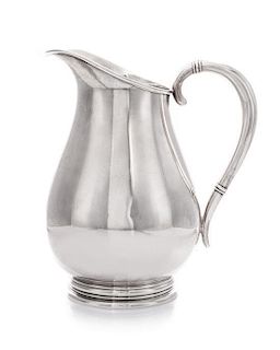 An American Silver Pitcher, International Silver Co., Meriden, CT, in the Royal Danish pattern, of baluster form, the handle hav