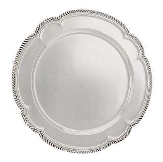 * An American Silver Meat Platter, Gorham Mfg. Co., Providence, RI, 1943, of shaped circular form having a gadrooned border, the