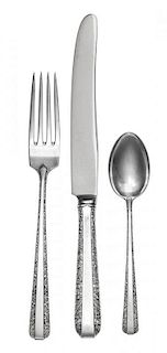 * An American Silver Flatware Service, Towle Silversmiths, Newburyport, MA, Candlelight pattern, comprising: 4 dinner knives 6 d