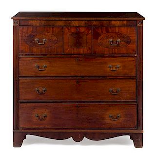 An American Mahogany and Satinwood Bachelor's Chest Height 46 1/4 x width 48 x depth 42 inches.