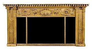 * An American Neoclassical Giltwood Mirror Height 36 1/4 x width 70 1/2 inches.