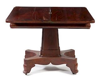 * An American Empire Mahogany Flip-Top Game Table Height 28 x width 36 x depth 18 inches (closed).