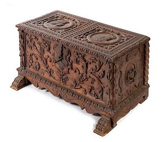 * A Renaissance Revival Carved Walnut Chest Width 34 1/4 inches.