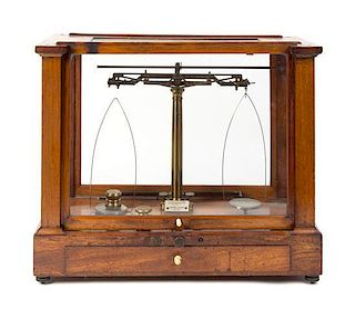 An American Cased Balance Scale Case height 16 x width 19 3/4 x depth 9 inches.