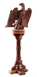 A Carved Walnut Choir Stand Height 69 inches.