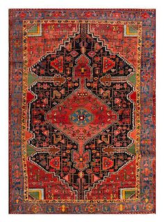 A Persian Wool Rug 6 feet 4 inches x 4 feet 4 inches.