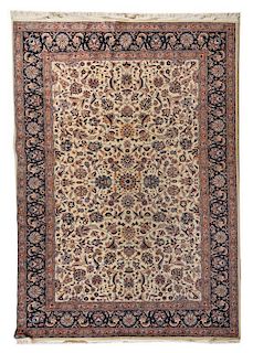 A Persian Wool and Silk Rug 10 feet 1 inch x 6 feet 9 inches.