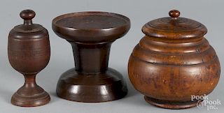 Turned fat lamp stand, 19th c., together with a lidded pease canister, 4 3/4'' h., and a lidded saffron cup