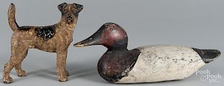 Carved and painted decoy, 16'' l., together with a cast iron dog doorstop, 8 1/4'' h.