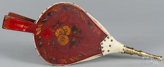 Painted bellows, 19th c., retaining its original floral decoration on a red ground, 19 3/4'' l.