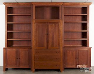 Cherry cabinet, by Thomas Moser, together with a custom five-part cherry bookcase surround, 94'' h.