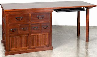 Modern cherry computer desk, 30'' h., 65 1/2'' w., together with a hanging cupboard with sliding doors