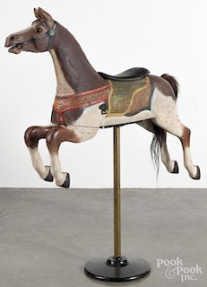Carved and painted carousel horse, 36'' h., 48'' w.