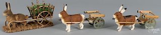 Three German rabbit and cart candy containers, two - 8'' l. and one - 9'' l.