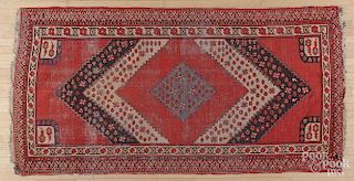 Semi-antique Shiraz carpet, 9'6'' x 4'9''.