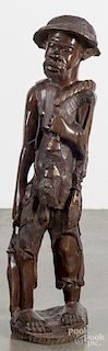 African carved figure of a fishmonger, 32'' h.