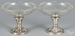 Pair of sterling silver weighted compotes with glass bowls, 4 3/4'' h., 6'' dia.