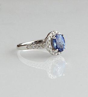 Lady's 14K White Gold Dinner Ring, with an oval 2.