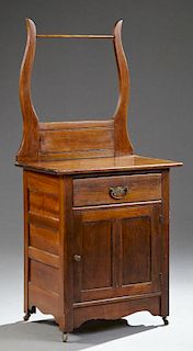 American Carved Birch Washstand, late 19th c., the