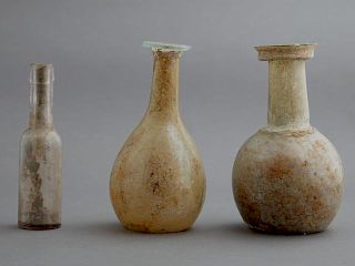 Group of Three Glass Bottles, two Roman glass, 1st