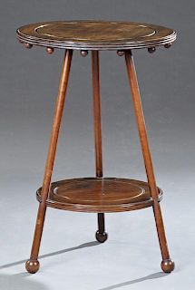 American Carved Walnut Lamp Table, late 19th c., t