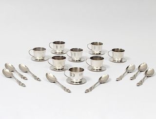 SET OF EIGHT STERLING SILVER MINIATURE CUPS AND SAUCERS