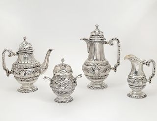 FOUR PIECE STERLING SILVER TEA AND COFFEE SERVICE