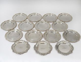 SET OF TWELVE STERLING SILVER BREAD AND BUTTER PLATES