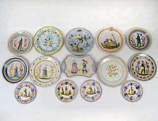 GROUP OF FIFTEEN QUIMPER & QUIMPER STYLE FAIENCE PLATES