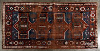 Two Caucasian throw rugs, early 20th c., 6'10'' x 3'5'' and 5' x 3'7''.