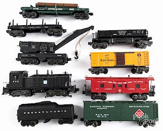 Lionel train cars, to include a 622 Santa Fe engine and tender, a 2460 crane, a 3469 dump car