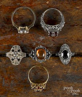 Six antique rings, to include an 18K yellow gold ring with a garnet cluster, a 14K yellow gold ring