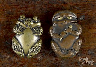 Two brass frog match vesta safes, ca. 1900, 2'' l. and 2 1/4'' l.
