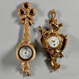 Two Small Cartel Clocks