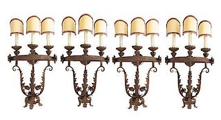 * A Set of Four Gilt and Patinated Metal Three-Light Sconces Height 19 inches.