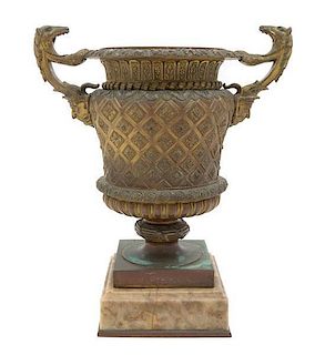 * A Neoclassical Gilt Bronze Urn Height 13 inches.