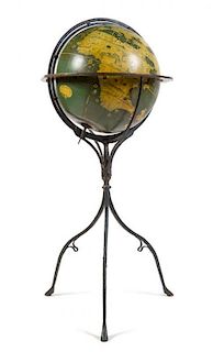 * A German Lithographed Terrestrial Floor Globe Height 51 inches.