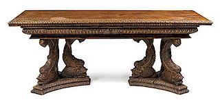 * An Italian Renaissance Walnut Twin Pedestal Table Height 32 x width 87 x depth 29 1/2 inches.