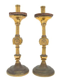 * A Pair of Gothic Style Brass Prickets Height 19 inches.